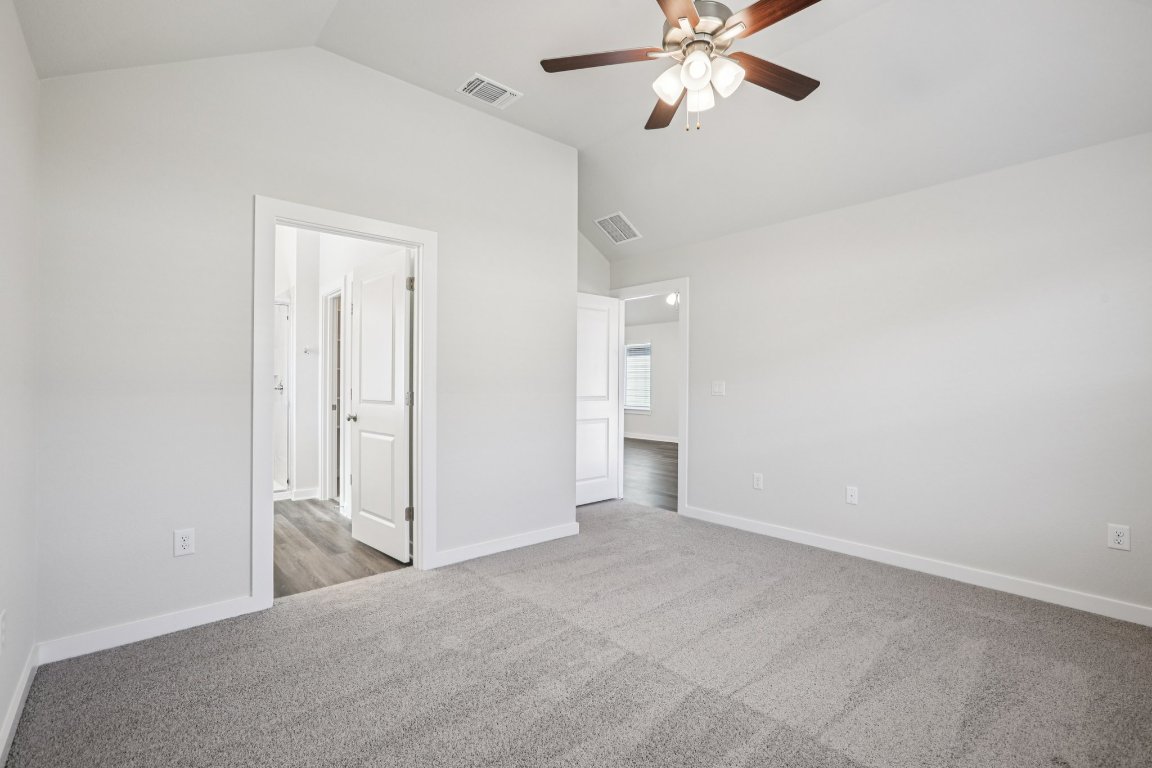 2304 Delano Drive Leander, TX 78641 - Photo 19 of 31 a view of a room with window and ceiling fan