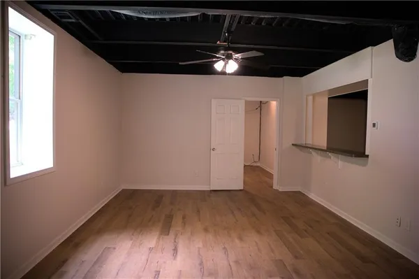 a kitchen with a table and chairs in it