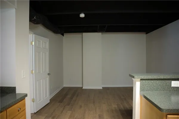 a kitchen with a sink a stove and refrigerator