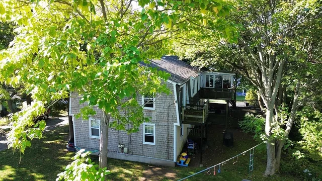 a backyard of a house with lots of green space
