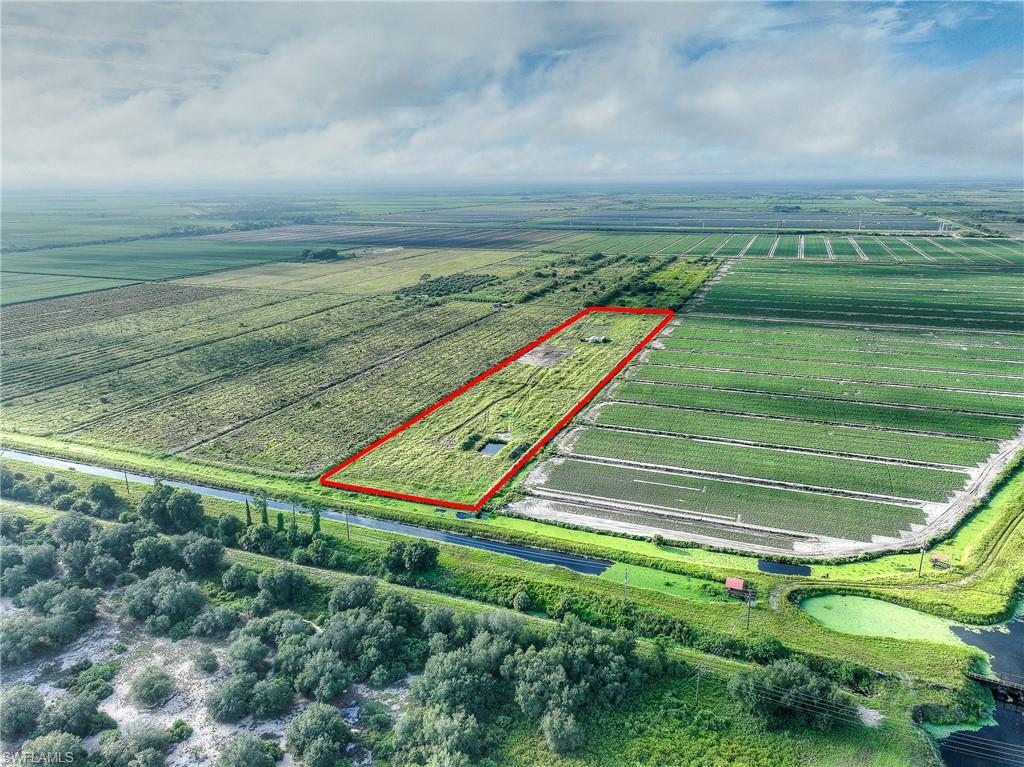 7050 6th Road LaBelle, FL 33935 - Photo 5 of 12 a view of a yard with an outdoor space