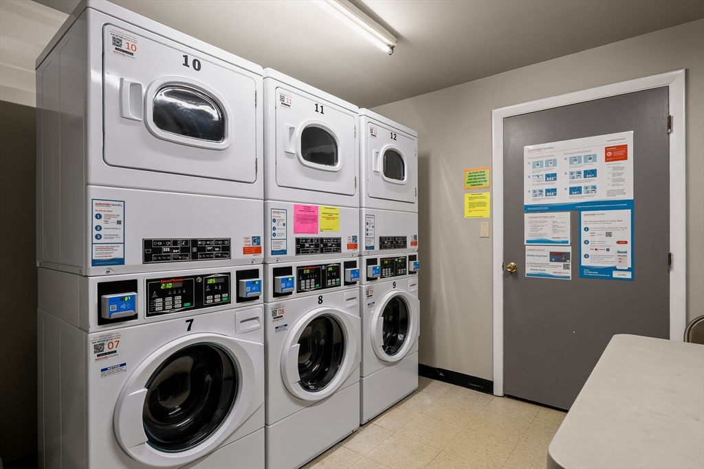 1206 Greendale Avenue, Unit 217 Needham, MA 02492 - Photo 28 of 33 a utility room with dryer and washer
