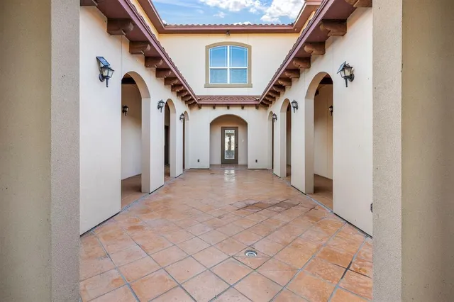 a view of a hallway with entryway