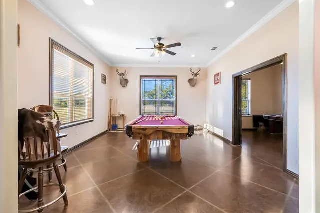 a lobby with furniture and window