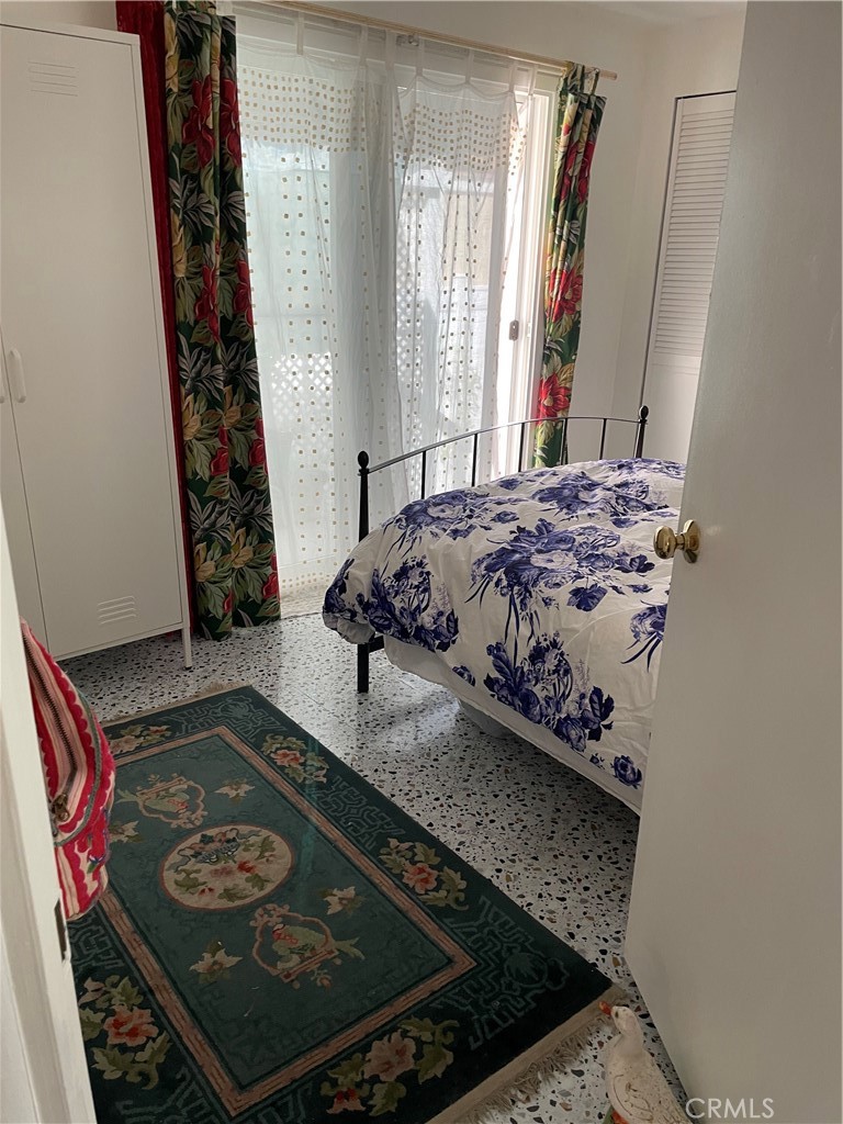 61 Hummingbird Lane Oceanside, CA 92057 - Photo 13 of 17 a bed sitting in a bedroom next to a window