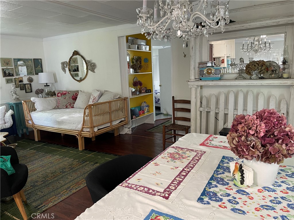 61 Hummingbird Lane Oceanside, CA 92057 - Photo 14 of 17 a living room with furniture and a chandelier