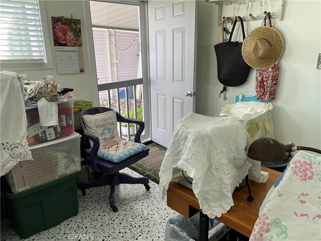 61 Hummingbird Lane Oceanside, CA 92057 - Photo 17 of 17 a living room with furniture and a chair