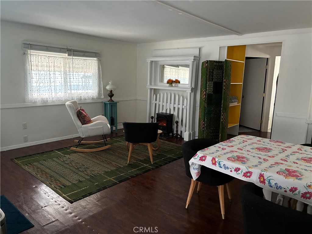 61 Hummingbird Lane Oceanside, CA 92057 - Photo 3 of 17 a living room with furniture rug and window
