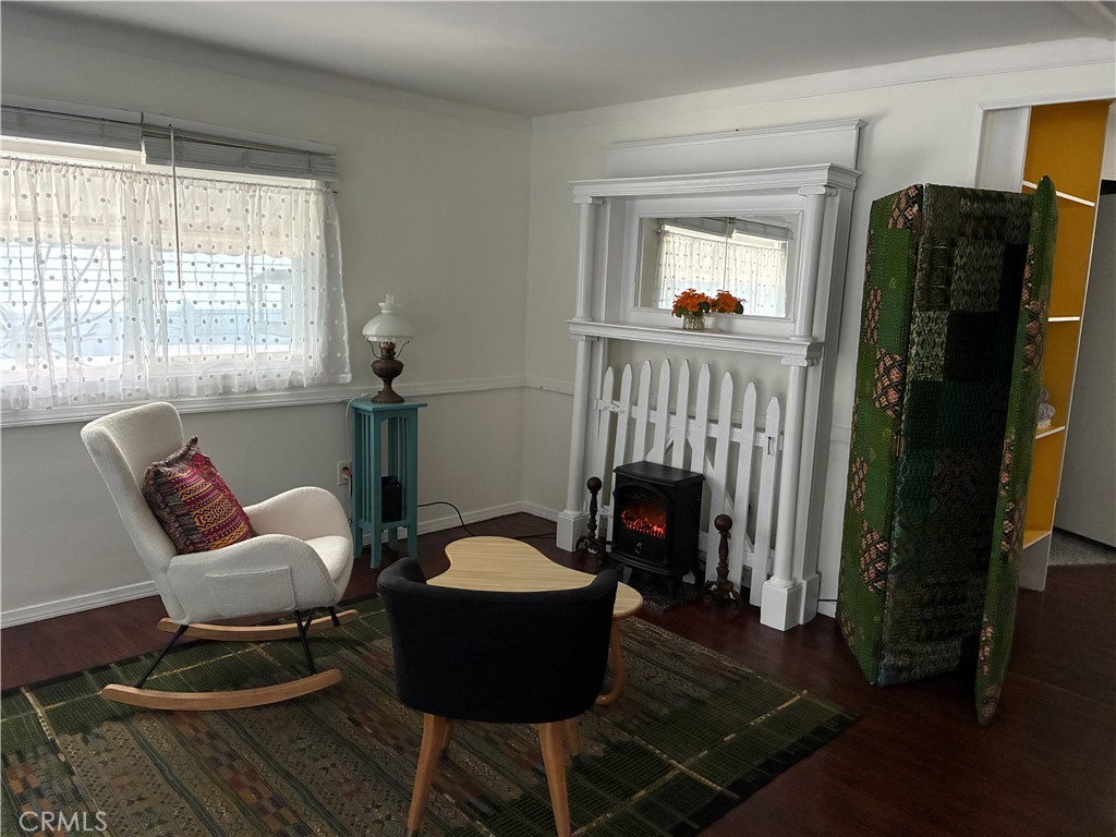 61 Hummingbird Lane Oceanside, CA 92057 - Photo 4 of 17 a living room with furniture and a fireplace