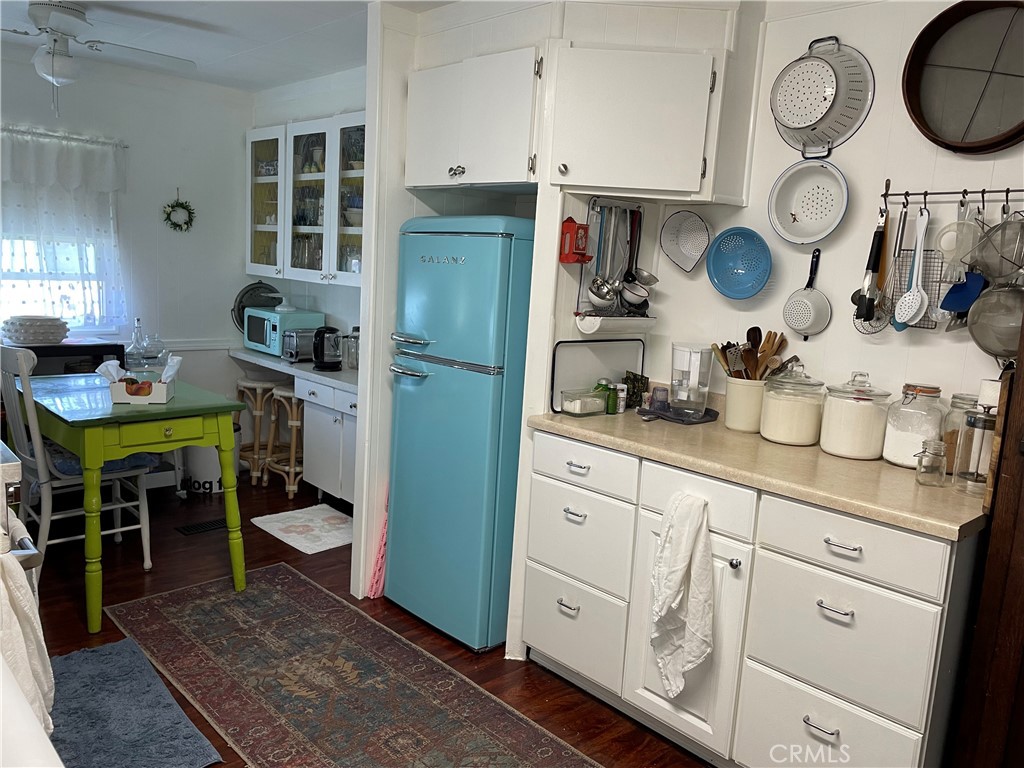 61 Hummingbird Lane Oceanside, CA 92057 - Photo 7 of 17 a kitchen with a sink and cabinets