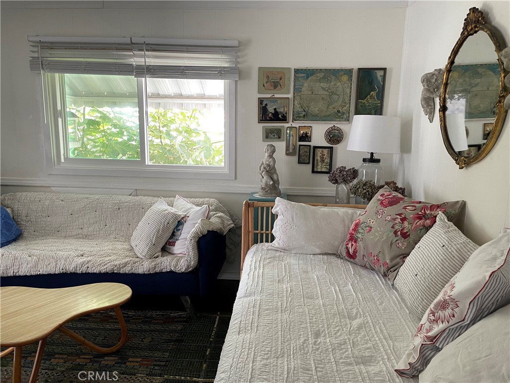 61 Hummingbird Lane Oceanside, CA 92057 - Photo 10 of 17 a bed sitting in a bedroom next to a window