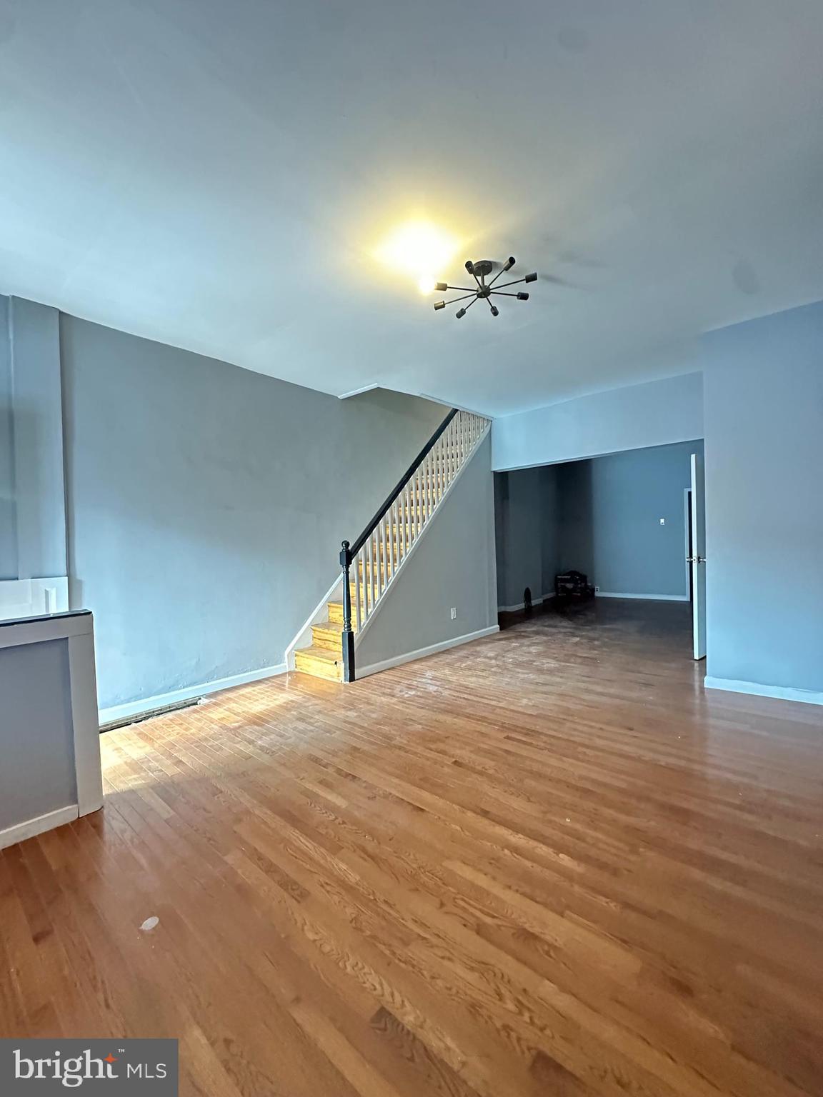 2812 Emerald Street Philadelphia, PA 19134 - Photo 5 of 25 a view of an empty room with wooden floor
