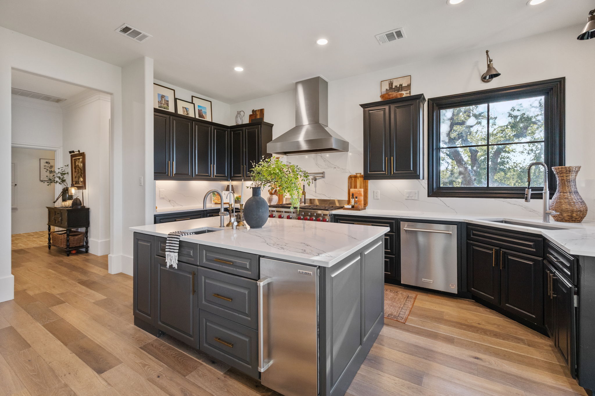 447 Winning Colors Austin, TX 78737 - Photo 11 of 40 Fully remodeled Kitchen boasts Subzero appliances, custom island, under counter icemaker and so much more