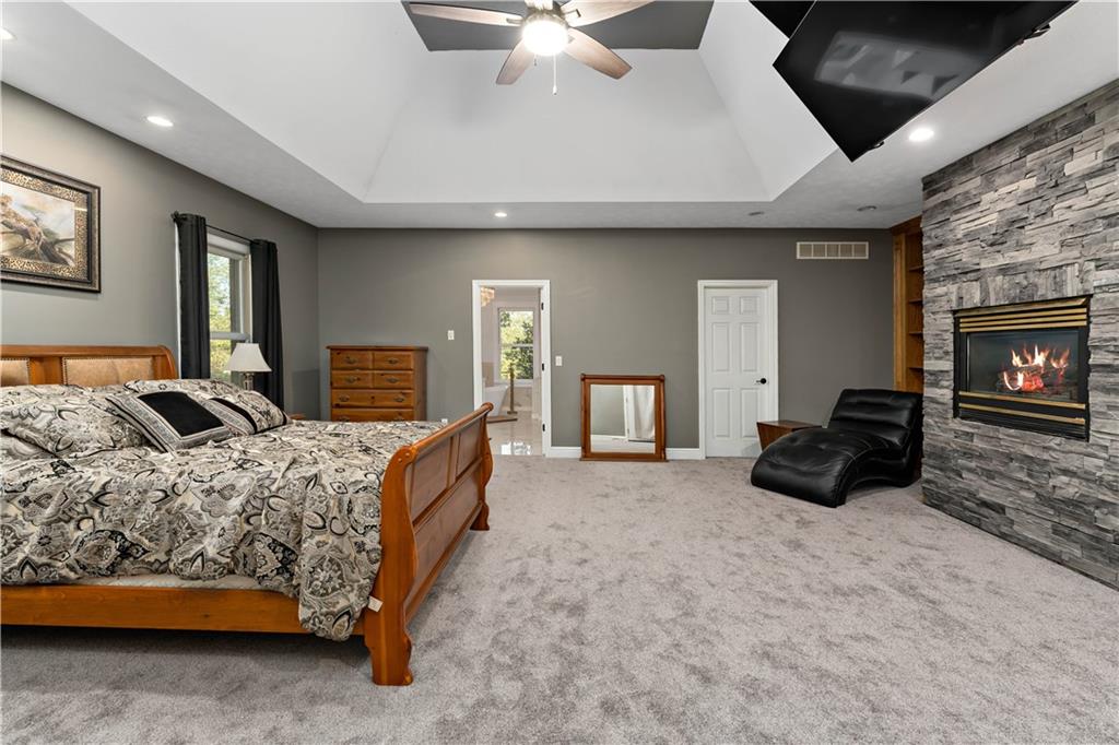 331 North Branch Road Oakdale, PA 15071 - Photo 14 of 41 a spacious bedroom with a bed a couch and dresser