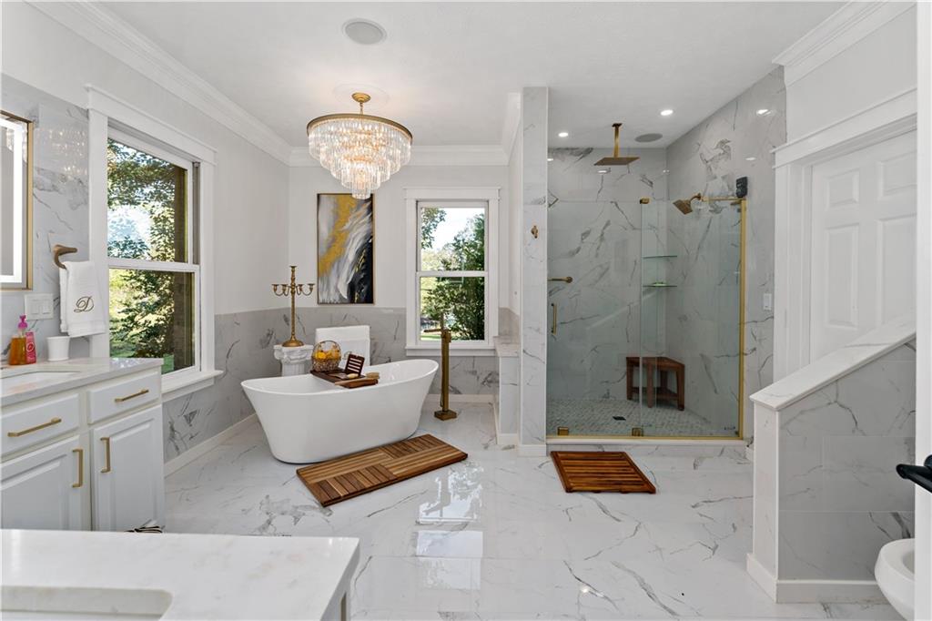 331 North Branch Road Oakdale, PA 15071 - Photo 15 of 41 a spacious bathroom with a shower a sink and a large mirror
