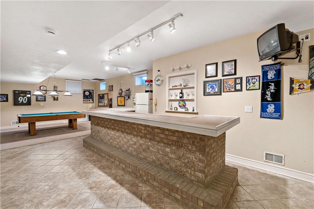 331 North Branch Road Oakdale, PA 15071 - Photo 28 of 41 a living room with stainless steel appliances furniture and a kitchen view