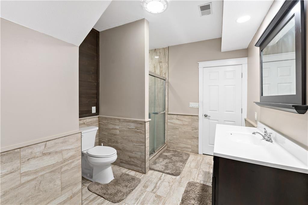 331 North Branch Road Oakdale, PA 15071 - Photo 31 of 41 a bathroom with a sink toilet and shower