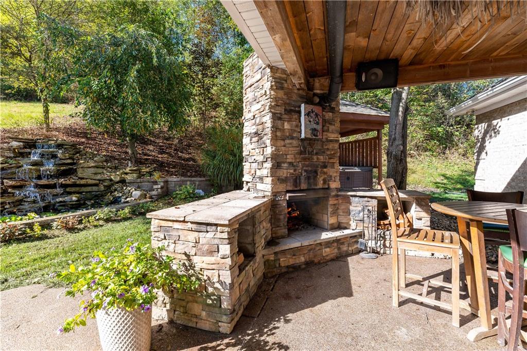 331 North Branch Road Oakdale, PA 15071 - Photo 33 of 41 a view of a patio with table and chairs and potted plants