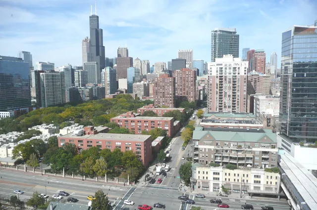 a view of a city with tall buildings