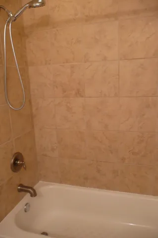 a bathroom with a bathtub