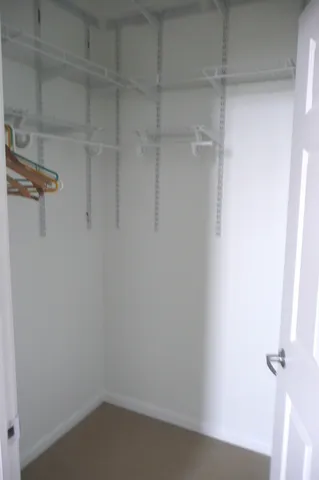 a view of a room with racks on the wall