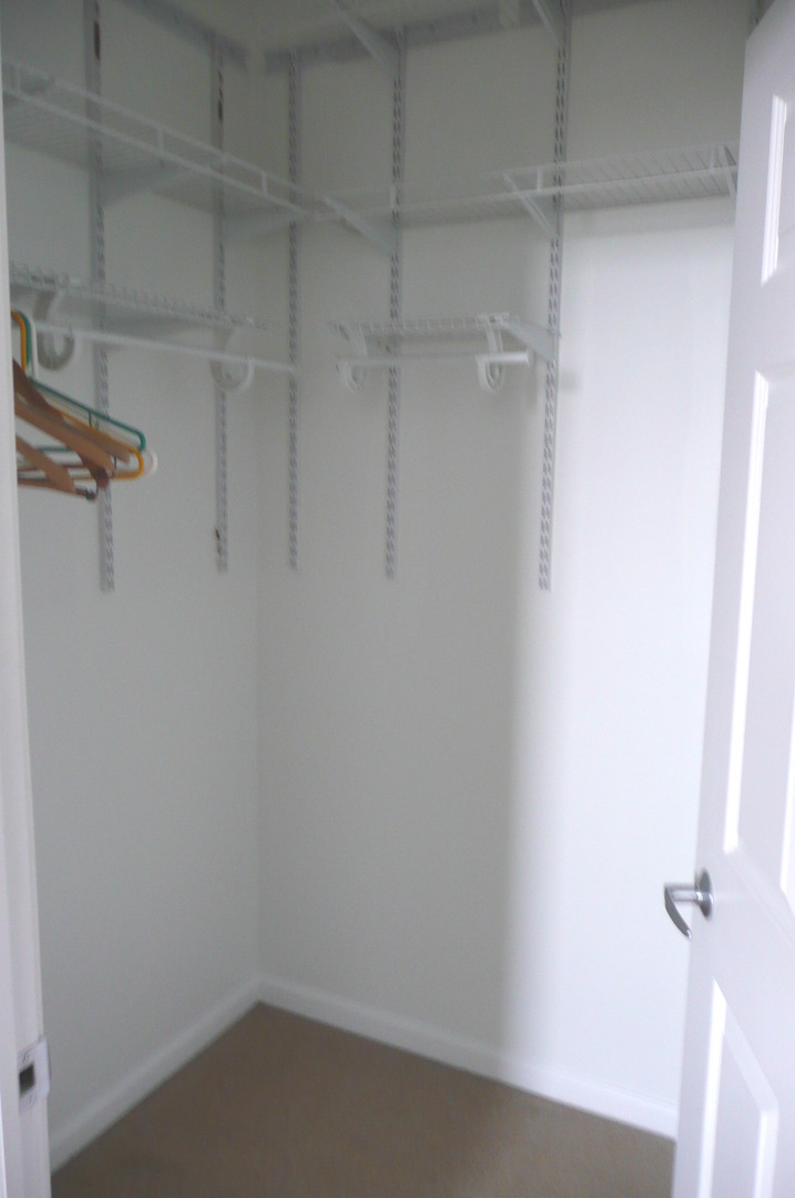 1255 South State Street, Unit 1902 Chicago, IL 60605 - Photo 22 of 33 a view of a room with racks on the wall