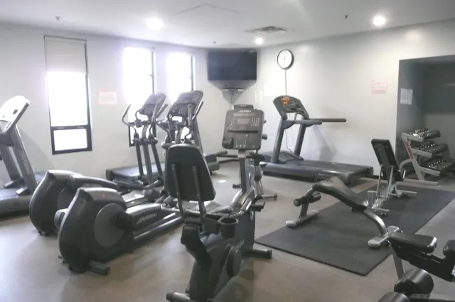 a view of a room with gym equipment