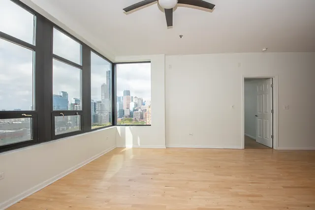 a view of an empty room with a window