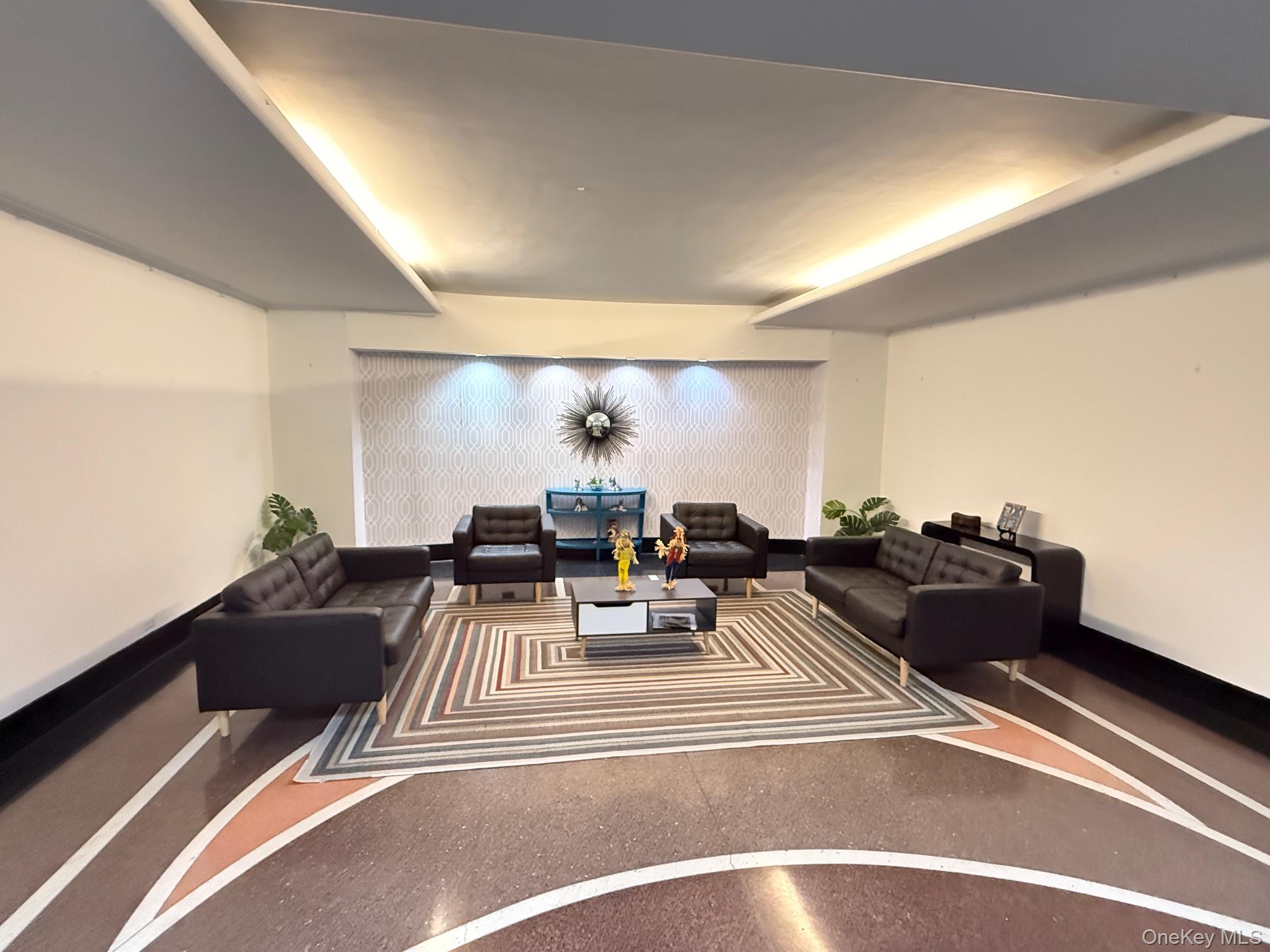 67-40 Yellowstone Boulevard, Unit 2O Queens, NY 11375 - Photo 12 of 12 a living room with furniture