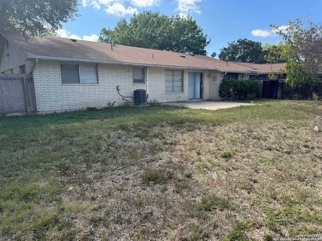 a view of house with yard and outdoor space