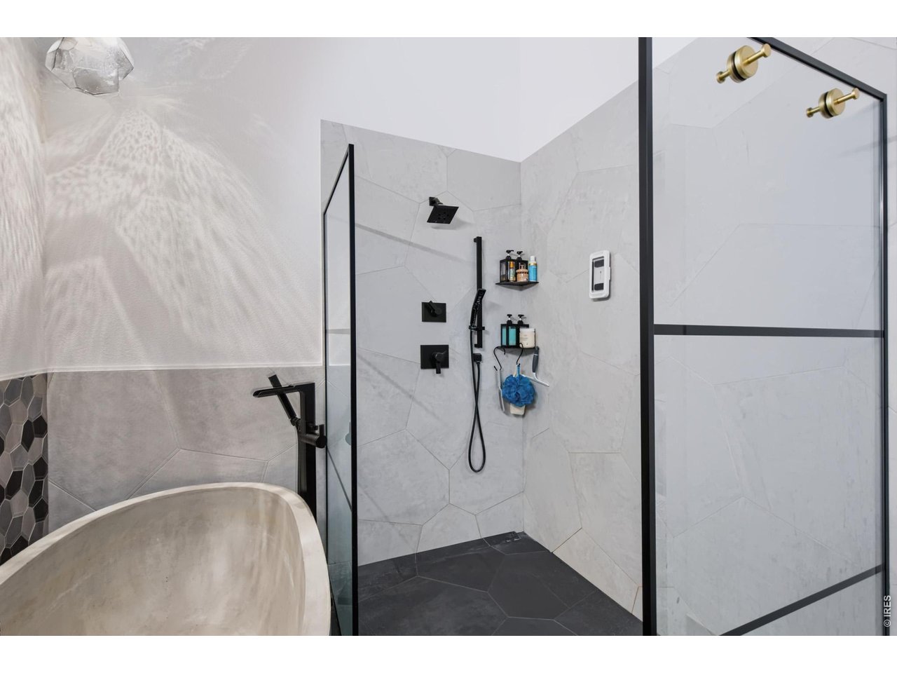 821 Laporte Avenue Fort Collins, CO 80521 - Photo 19 of 33 Custom made glass and steel shower.