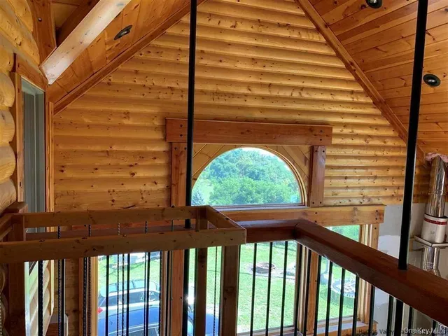 a view of a balcony with an outdoor space