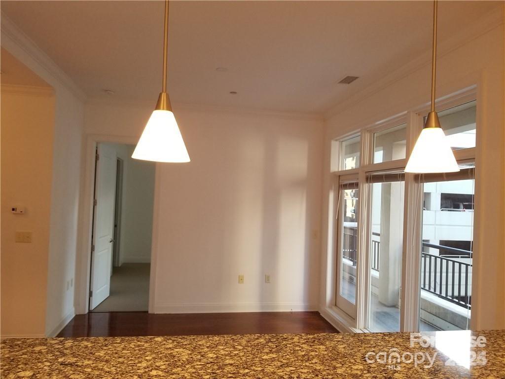 230 South Tryon Street Charlotte, NC 28281 - Photo 12 of 12 a view of entryway with wooden floor