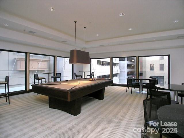 230 South Tryon Street Charlotte, NC 28281 - Photo 2 of 12 a living room with fireplace furniture and a large window