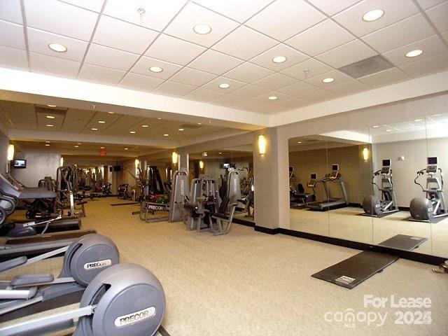 230 South Tryon Street Charlotte, NC 28281 - Photo 3 of 12 a view of a room with gym equipment