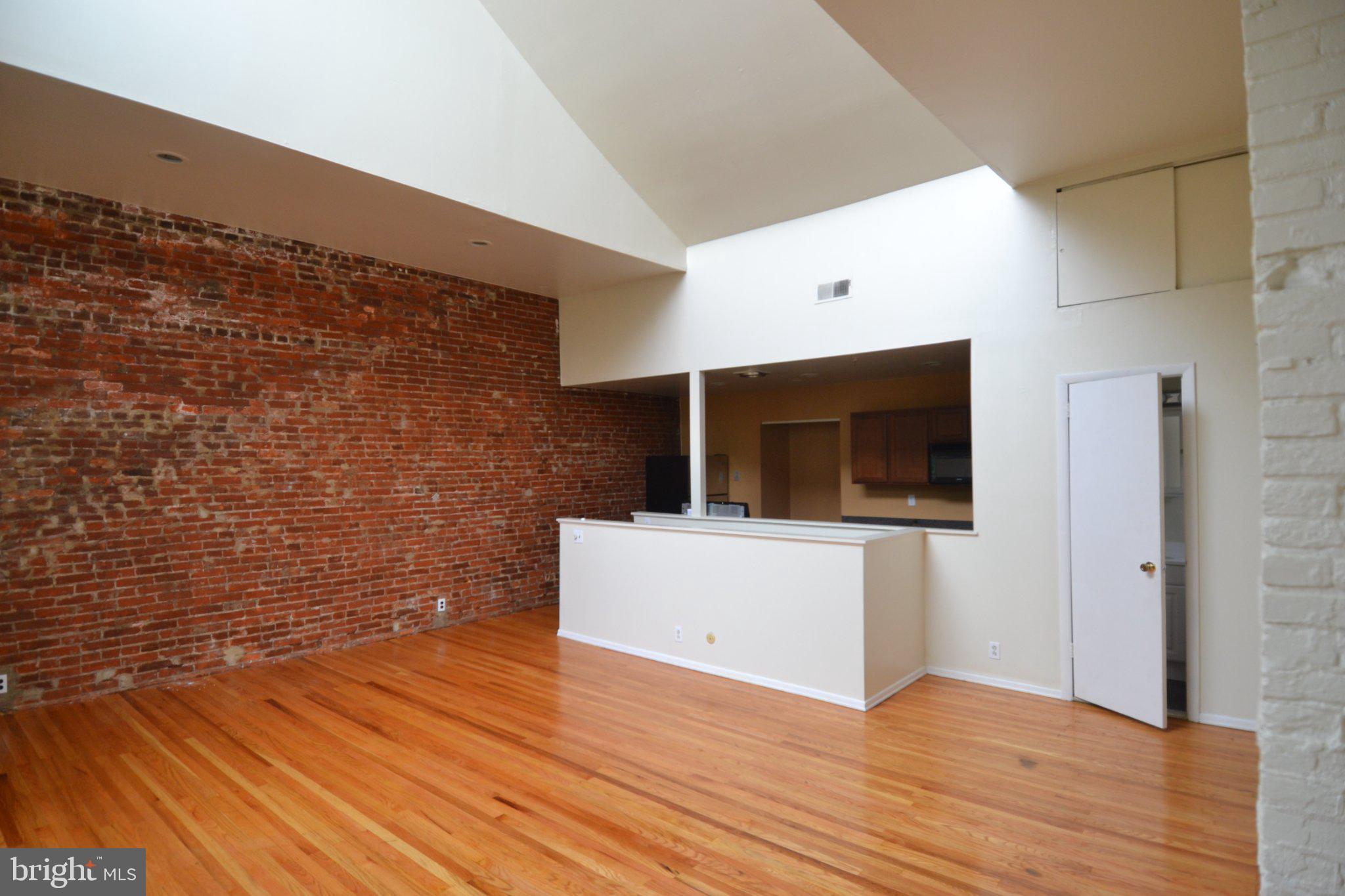 1010 Clinton Street, Unit 3M Philadelphia, PA 19107 - Photo 2 of 15 Spacious loft with exposed brick charm.