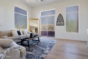 a living room with furniture and a gate