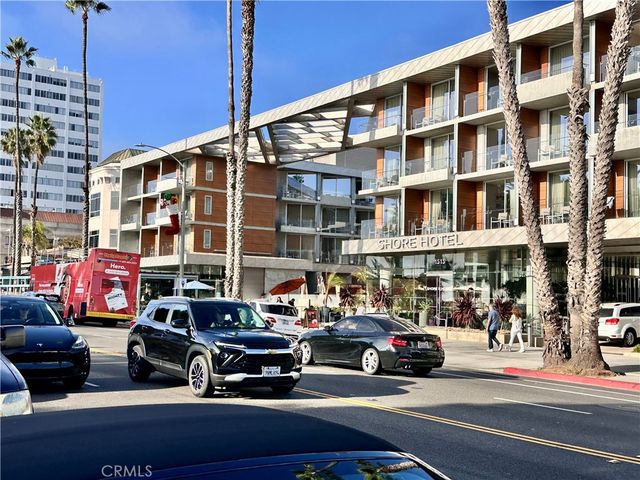 a front view of a building with garden