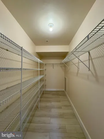 a view of a room with racks on the wall