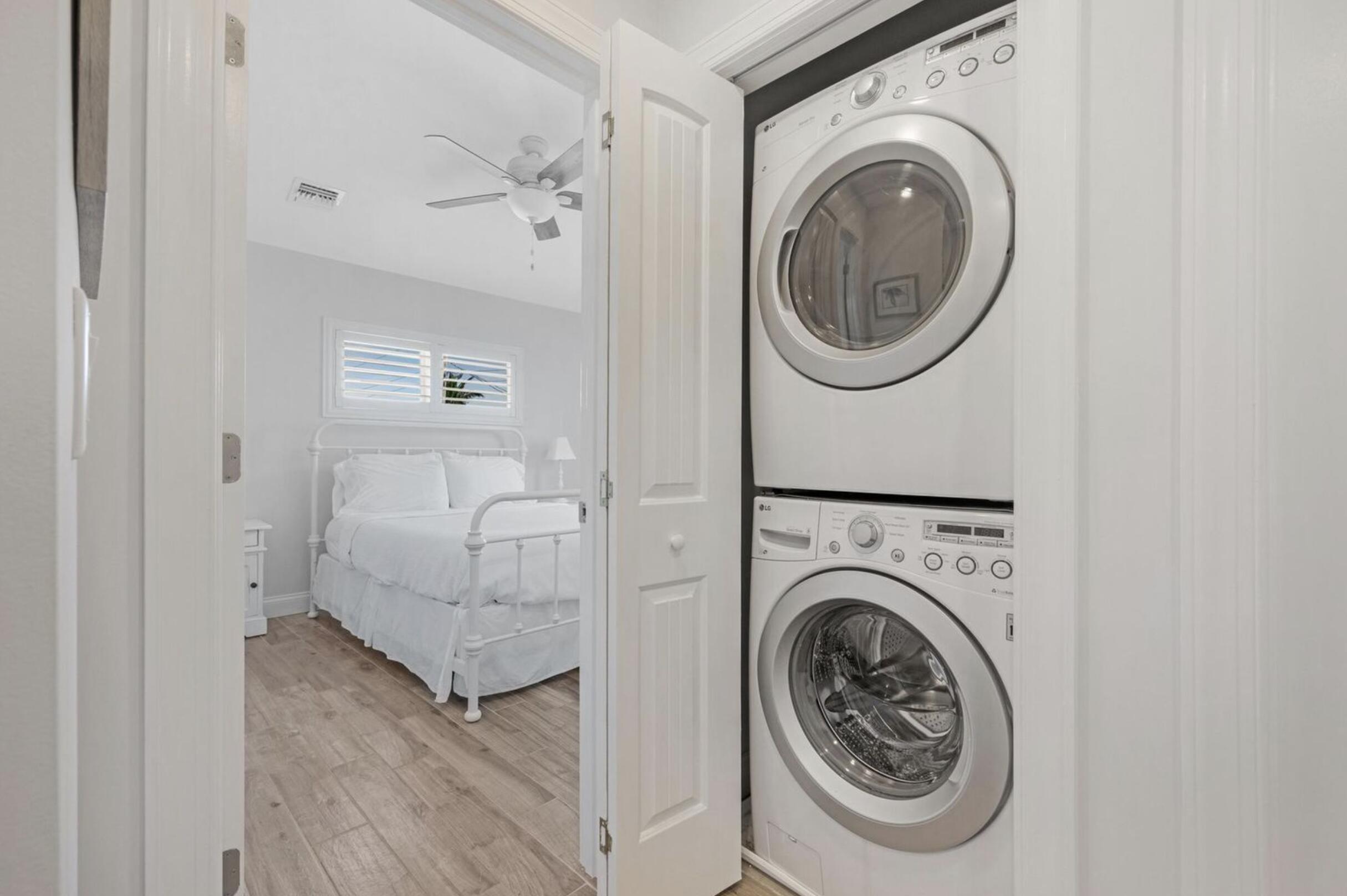 102 Venetian Drive Islamorada, FL 33036 - Photo 20 of 29 a utility room with dryer and washer