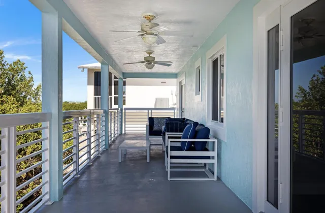 a view of a balcony with an outdoor space
