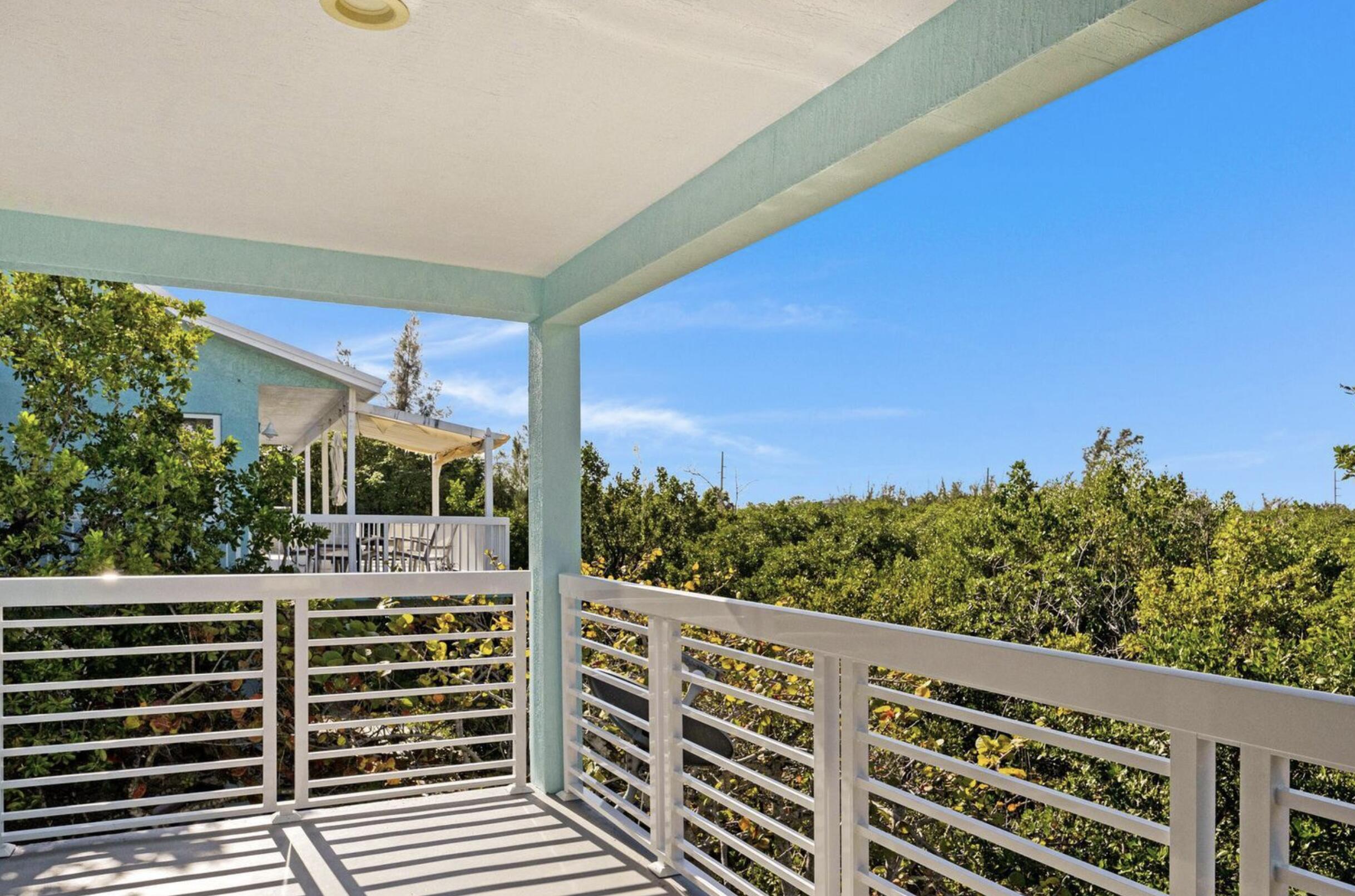 102 Venetian Drive Islamorada, FL 33036 - Photo 22 of 29 a view of a balcony with an outdoor space