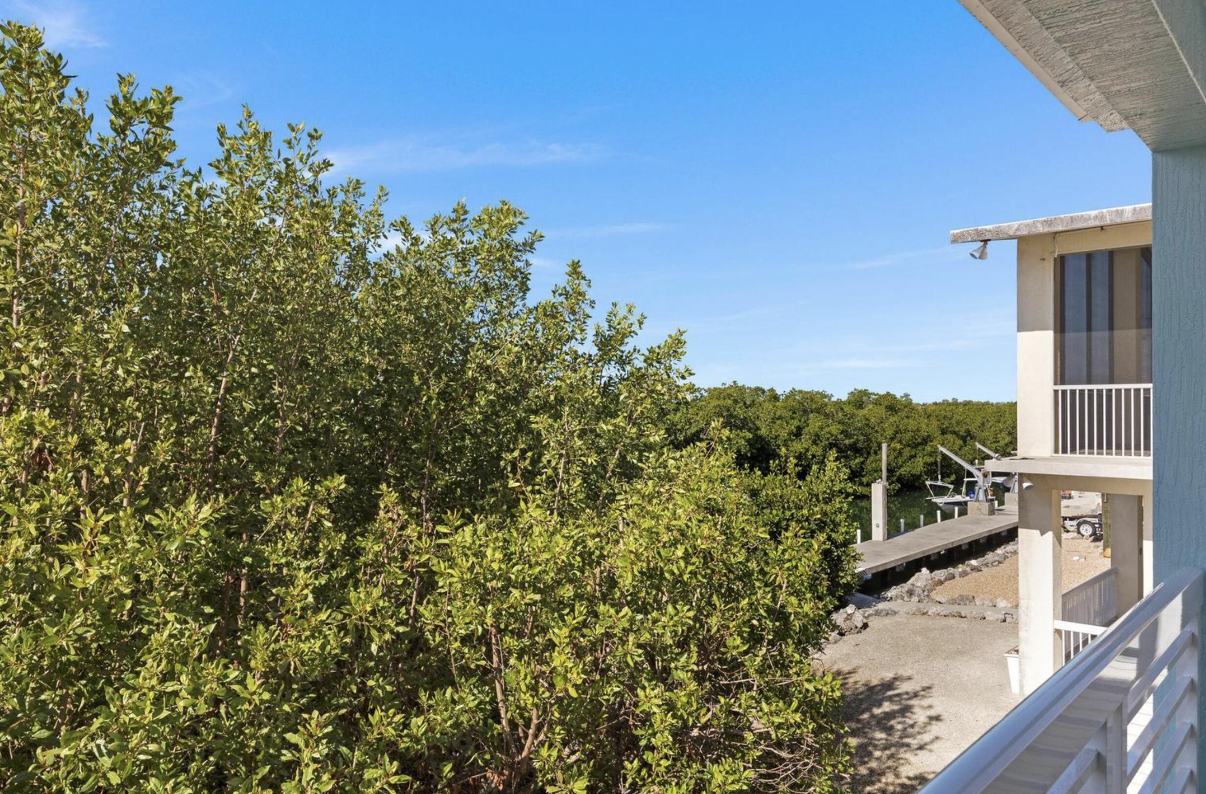 102 Venetian Drive Islamorada, FL 33036 - Photo 24 of 29 a view of a balcony with an outdoor space