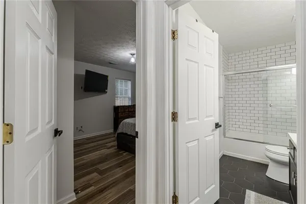 a bathroom with a sink and toilet