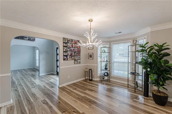 a view of livingroom with furniture and wooden floor