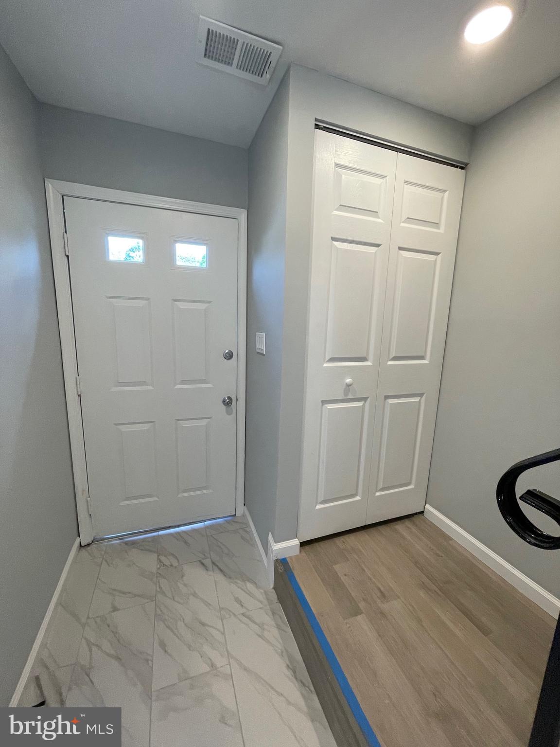 124 Andrew Place Sterling, VA 20164 - Photo 3 of 70 an empty room with wooden floor
