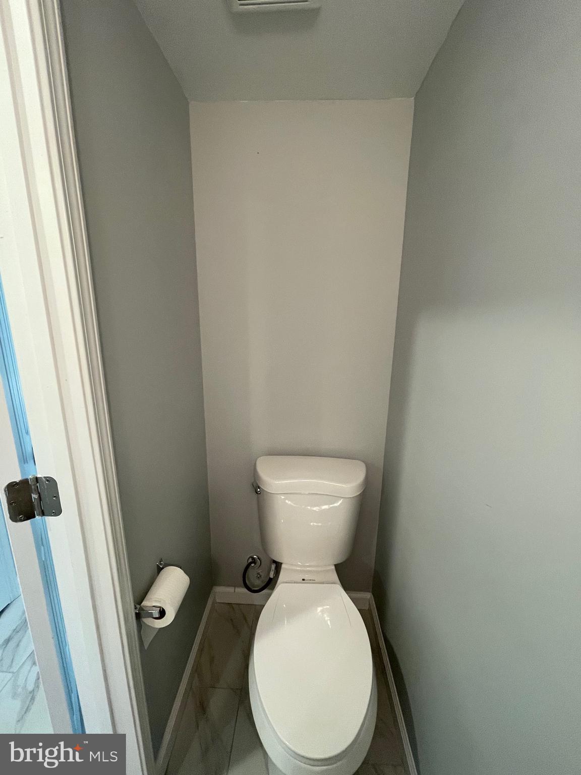 124 Andrew Place Sterling, VA 20164 - Photo 39 of 70 a white toilet sitting next to a sink