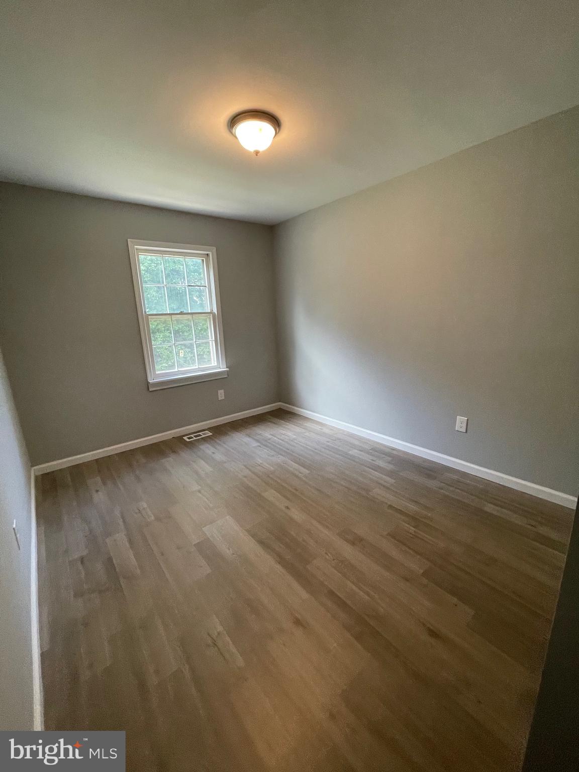 124 Andrew Place Sterling, VA 20164 - Photo 50 of 70 an empty room with a window