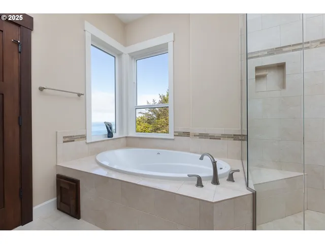 a kitchen with granite countertop a refrigerator stove and sink