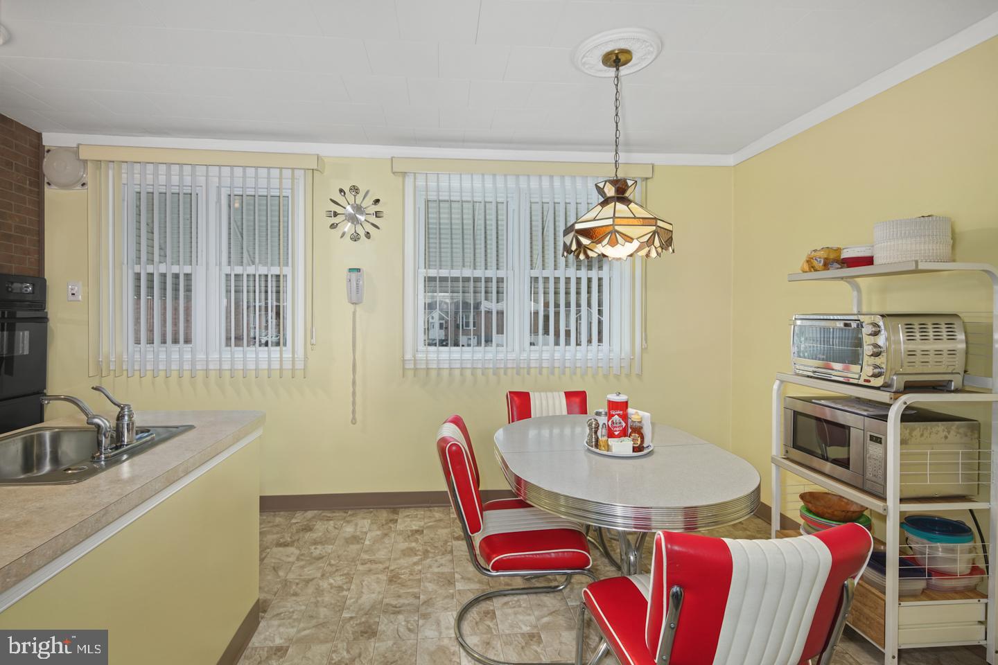 10803 Pedrick Road Philadelphia, PA 19154 - Photo 12 of 25 a dining room with furniture and window